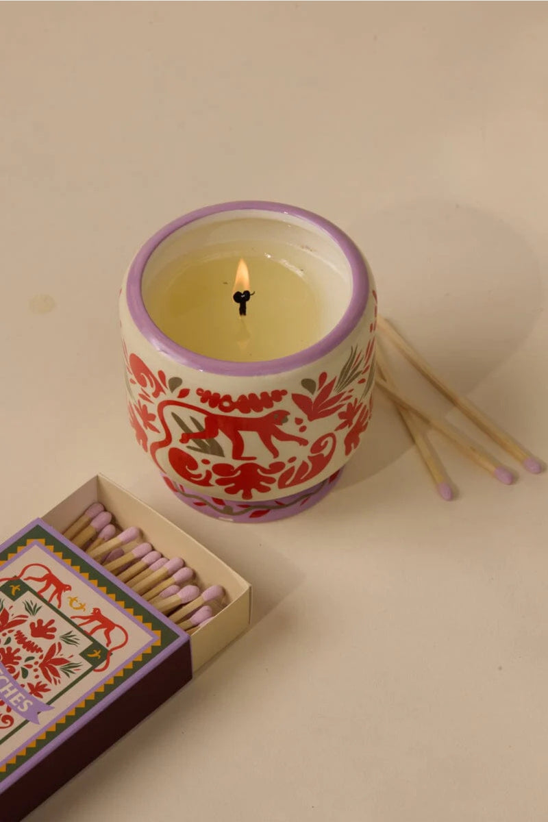 A Dopo 8 oz Hand Painted Ceramic Candle