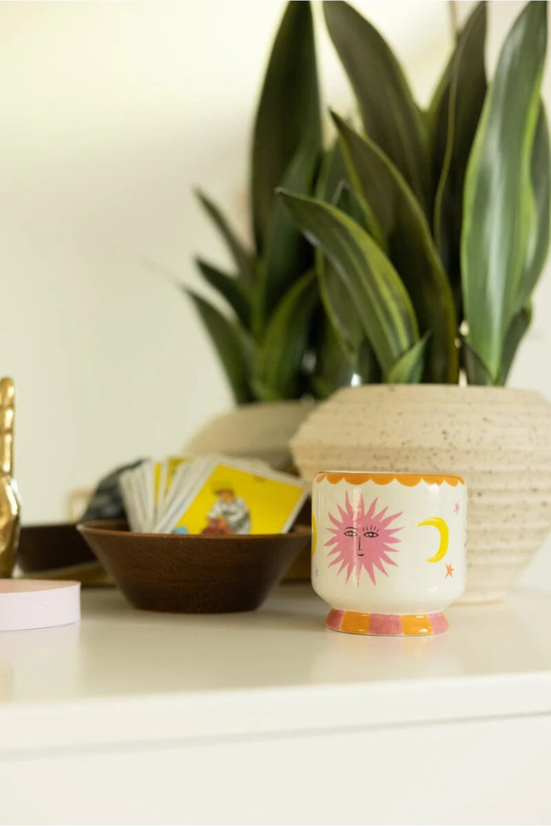 A Dopo 8 oz Hand Painted Ceramic Candle